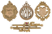 MUSIC AWARDS, ETC: a 9ct gold fob (6.7gms) engraved "Winners Carnival Contest 1922 L.Heaps"; a 9ct gold fob (8.3gms) engraved "Swan Hill 1932" and verso "SWAN HILL BAND CONTEST Pres. by CR. H. PYE, J.P. to LES HEAPS Winning Band Master". Also, a 15ct gold