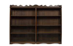 An Australian library bookcase with adjustable shelves, stained kauri pine early 20th century, 163cm high, 210cm wide, 30cm deep