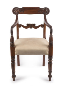 An early Colonial cedar carved chair with carved back and fine triple ring turned legs, Tasmanian origin, circa 1830, ​88cm high, 48cm across the arms