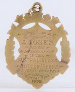 A 15ct gold fob (5.9gms) engraved "A.J. 4.4.08" on the front and verso "Presented to A. Jones. Hon. Sec. By the Employees of the AUSTRAL. GLASS BOTTLE WORKS, as a token of esteem, 1st Annual Picnic." The Austral Glass Bottle Works was established in Wate - 2