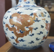An antique Chinese porcelain vase decorated with five iron red and gold celestial dragons on underglaze blue and white ground, Guangxu period, Qing Dynasty, late 19th century early 20th century, Qianlong underglaze blue six character mark to base, 38cm hi - 6