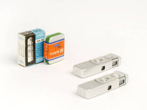 MINOX (Germany): Minox III-S sub-miniature cameras, 1955-56, [#77262 - feet] and [#101923 - metric]; both in leather cases with chains. Accompanied by 3 unopened film cassettes in original packaging.