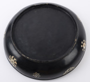 An 18th century Chinese Ryukyuan black lacquered covered bowl with mother of pearl inlay adorned with gilded Shou good luck symbol incorporating two Wan symbols, 15cm high, 39cm diameter. Note: A near identical example was auctioned at Sotheby's, London, - 7