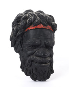 Painted ceramic male Aboriginal face plaque, with wall mount, 25cm high.