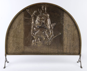 A vintage fire screen, embossed brass and copper with kookaburra design, circa 1930s, 65cm high, 82cm wide