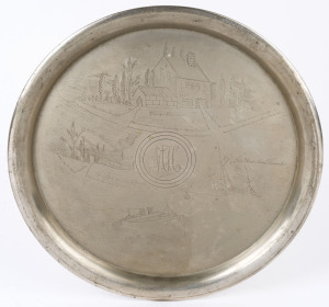 A circular silver plated serving tray engraved "CAPTAIN COOK'S COTTAGE", early 20th century, 35cm diameter