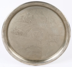 A circular silver plated serving tray engraved "CAPTAIN COOK'S COTTAGE", early 20th century, ​35cm diameter