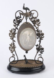 An antique Australian centrepiece, carved emu egg with lyre bird and kangaroo in silver plated mounts adorned with emu and kangaroo, 19th century, 32cm high