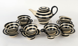 SANDRA BOWKETT pottery tea ware comprising of a teapot and 6 cups and saucers, (13 pieces), signed "Sandra Bowkett", the pot 15cm high, 24cm wide