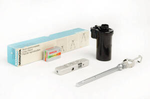 MINOX (Germany) Minox LX, 1979, sub-miniature camera [#2502656] with leather case and chain in original Minoxbox; together with a Minox pocket tripod with adapter, a Minox copy stand in box, a Minox Daylight Developing Tank in box and3 boxes of unexposed 