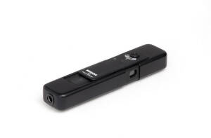 MINOX (Germany): Minox LX sub-miniature camera, 1980, [#2515358] in black; with leather case. Also, 2 unexposed film cassettes in original boxes.
