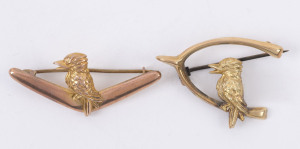 KOOKABURRAS: Two 9ct gold brooches (2.7gms) featuring kookaburras, one on a wishbone and one on a boomerang, (2).