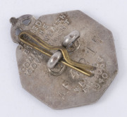 "RESERVED OCCUPATION" white metal badge by Wallace Bishop, dated 1940 verso. Issued to persons in reserved occupations who had volunteered to serve with any service if called upon at any time during the war (but who were deemed to be required to remain at - 2