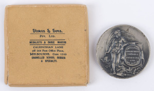 Education Department Victoria: Swimming and Life Saving medallion 50mm in silvered bronze by Stokes; edge impressed to "ERIC HIRST 1937-38"; EF in box of issue, which is signed by Hirst.