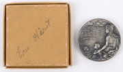Education Department Victoria: Swimming and Life Saving medallion 50mm in silvered bronze by Stokes; edge impressed to "ERIC HIRST 1937-38"; EF in box of issue, which is signed by Hirst. - 2