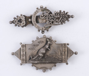 Two sterling silver brooches (lacking back clips) circa 1900; one depicts a kangaroo in a landscape; the other with "Fighting Bobs" and engraved "South Africa". (2). 