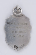 A silver & 9ct gold cricket award fob engraved verso "NEWS LEAGUE - 1930 - WINNER G. COX". - 2