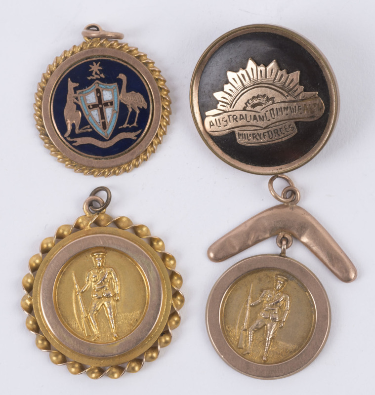 PATRIOTIC FOBS & A BADGE comprising of an enamel and 9ct gold fob with the Australian Coat of Arms; a 9ct gold fob depicting a soldier with his rifle; another similar 9ct fob but surmounted by a boomerang; and a 9ct gold badge (lacking clasp) with the Aus