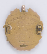 TARGET SHOOTING: 9ct gold and enamel fob (9gms), engraved verso "Regimental Championship 3rd Stage Won by Sgt. C.A. Jeffrey, Score 323 - 25.4.09". - 2
