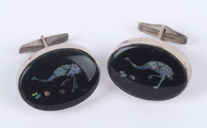 A pair of sterling silver and inlaid opal cufflinks, (2).