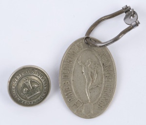 POST OFFICE: "PMG's DEPARTMENT ENGINEERING BRANCH fob with the messenger Hermes on the front and registration details (VIC. 1780) verso; also, a POST MASTER GENERAL'S DEPARTMENT jacket button by A.J. Parkes of Brisbane. (2 items).