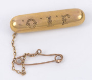 An antique Colonial yellow gold bar brooch with engraved initials "J.I.O." for JEAN ISOBEL OATES, late 19th century, 3.2cm wide, 2.2 grams. Oates' father, RICHARD OATES rocketed to fame on the Australian goldfields with the astonishing discovery of the WE - 2