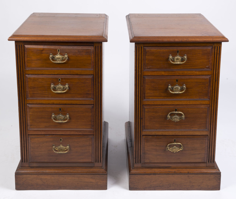 A pair of antique Australian four drawer bedside cabinets by SVENSSON of Melbourne, black walnut with original brass hardware, 77cm high, 42cm wide, 52cm deep