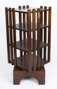 An Australian revolving blackwood bookstand, circa 1930, with sterling silver presentation plaque "Presented to the REV.d R. W. FINGER N. A., B.D. By His Friends in The Beaufort Circuit 6.4.30", 127cm high, 56cm wide, 56cm deep