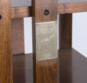 An Australian revolving blackwood bookstand, circa 1930, with sterling silver presentation plaque "Presented to the REV.d R. W. FINGER N. A., B.D. By His Friends in The Beaufort Circuit 6.4.30", 127cm high, 56cm wide, 56cm deep - 2