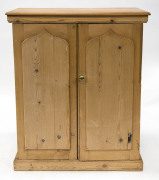 An antique Colonial shield door stationery cabinet, Baltic pine, South Australian origin, 19th century, ​120cm high, 95cm wide, 42cm deep