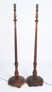 A pair of Australian standard lamp bases, carved Tasmanian oak, circa 1920, 150cm high