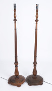 A pair of Australian standard lamp bases, carved Tasmanian oak, circa 1920, ​150cm high