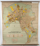 "Melbourne Metropolitan Planning Scheme" 1968 wall map by the Melbourne & Metropolitan Board of Works, linen backed and with wooden rollers top and bottom, 138 x 119cm.