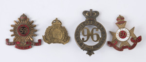 A group of regimental hat badges: 96th Regiment of Foot (English); "The Hume Regiment" (the 59th); "The Heidelberg Regiment" (the 60th); and the 10th Regiment, North Otago Rifles, New Zealand. (4 items).