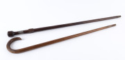Two walking sticks, one snakewood with silver collar inscribed "Presented To A. HESFORD On His Promotion To Sub Inspector By His Comrades At Castlemaine", the other fiddleback blackwood, early 20th century, 83cm and 92cm high - 2