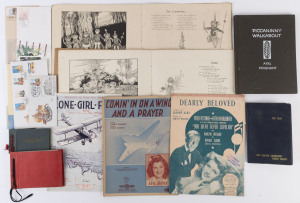 A "mixed-bag" in a small box. Noted "The Lone-Girl-Flyer" music (with Amy Johnson and her plane on the front cover); "Comin' in on a Wing and a Prayer" music; other sheet music; a copy of "Piccaninny Walkabout"; several first day covers; WW2 era photo neg