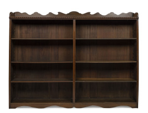 An Australian library bookcase with adjustable shelves, stained kauri pine early 20th century, 163cm high, 210cm wide, 30cm deep