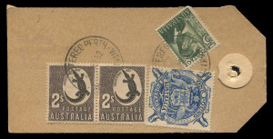 AUSTRALIA: Postal History: PARCEL TAGS/LABELS: 1952 (Apr.22) tag for Millars' Timber & Trading Co. with £1 Arms, 2/- Crocodile pair & KGVI 3d tied by REGISTERED PERTH datestamp, addressed to Harvey. The parcel likely contained the company payroll, and as coins & bullion could not be sent at parcel rate, it would have been sent at the letter rate of 3½d for 1st oz, then 2½d x111 for each additional oz, plus 9d registration, for an item weighing 7lbs (overpaid 1d).