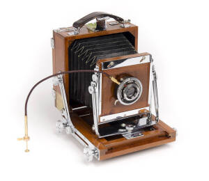 NAGAOKA SEISAKUSHO (Japan): light-weight folding field camera with Balda lens in Compur shutter on removable faceplate.
