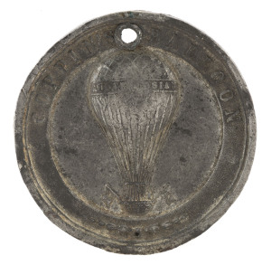 Medallions & Badges: COPPIN'S BALLOON - AEROSTATIC MEDAL: in white medal, 38mm diameter, verso inscribed 'CREMORNE GARDENS/VICTORIA 1858', pierced at top. Rare. George Coppin was an English-born comic actor, entrepreneur & politician, who resided in Aus