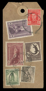 AUSTRALIA: Postal History: PARCEL TAGS/LABELS: c.1948-49 tag for Millars' Timber & Trading Co. with Robes 10/- Thick Paper & 5/- Thin Paper plus 2/- Crocodile, 1/- Lyrebird, 9d Platypus & KGVI 2½d tied by indistinct (likely REGISTERED PERTH) datestamps, a