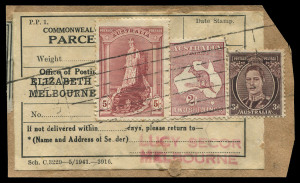 AUSTRALIA: Postal History: PARCEL TAGS/LABELS: 1940s label adhered to parcel fragment, 5/- Robes Thick Paper, 2/- Roo & KGVI 3d Brown, tied by weak strike of YEPPOON (Qld) parcels cancel, addressed to Lucy Secor (Melbourne fashion house). 7/3d rate paid the Scale 4 inter-state (non-adjoining) rate for a parcel weighing up to 11lbs.