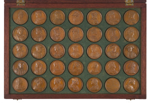 DASSIER'S SOVEREIGNS OF ENGLAND MEDALS: George II, The Kings and Queens of England, by Jean Dassier, the complete set of thirty three bronze medals, 1731, with additional medals (2), from William I to George II, the last being the dedication medal (MI.498/43), and with the bronze medal of Queen Caroline (MI.499/44), all 41mm; contained in flat mahogany fitted case (interior re-lined in green felt), a choice set, the medals in mint state (35). Accompanied by the original brochure.
