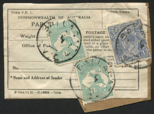 AUSTRALIA: Postal History: PARCEL TAGS/LABELS: 1927 label, adhered to parcel fragment, franked with Third Wmk 1/- Die IIB (2) and KGV SMult P.14 3d Blue tied by weak strikes of 1927 BALLARAT datestamp.