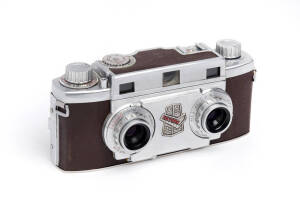 REVERE CAMERA CO. (U.S.A.): Stereo 33, c1953 stereo viewfinder camera [#V-17407] with Wollensak f3.5 35mm lenses, MFX sync.;in maker's leather ERC with instruction manual.