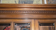 An Australian cedar bookcase, two doors with bevelled glass panels, four drawers, dentil moulded pediment and adjustable shelves, late 19th century, 211cm high, 155cm wide, 43cm deep - 3