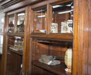 An Australian cedar bookcase, two doors with bevelled glass panels, four drawers, dentil moulded pediment and adjustable shelves, late 19th century, 211cm high, 155cm wide, 43cm deep - 5