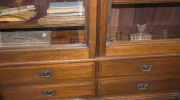 An Australian cedar bookcase, two doors with bevelled glass panels, four drawers, dentil moulded pediment and adjustable shelves, late 19th century, 211cm high, 155cm wide, 43cm deep - 7