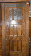 An Australian Arts & Crafts wardrobe, fiddleback blackwood with copper strap hinges and fine repouss&eacute; panels, circa 1900, 230cm high, 216cm wide, 71cm deep - 2