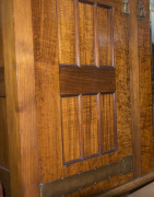 An Australian Arts & Crafts wardrobe, fiddleback blackwood with copper strap hinges and fine repouss&eacute; panels, circa 1900, 230cm high, 216cm wide, 71cm deep - 6